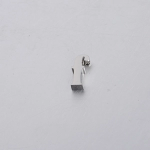 Macro detail of a 10mm polished stainless steel lowercase letter f charm bead