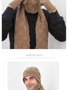 Close-up of three-piece knitted set featuring scarf, hat, and gloves in camel brown