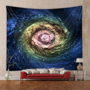 Cosmic galaxy tapestry hanging over a red sofa in a modern minimalist living room setting