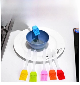 Detailed view of colorful heat-resistant silicone basting brushes for baking and BBQ