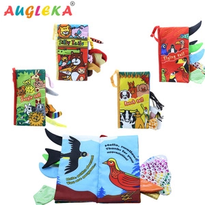 Detail of colorful soft baby cloth books with 3D animal tails and interactive pages