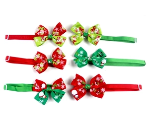 Detailed view of six Christmas pet bowties with snowflake patterns and adjustable buckles