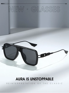 Detail view of square black sunglasses featuring industrial hollow temple arm design