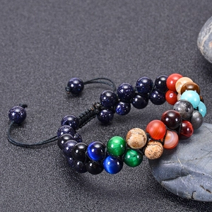 Detail of double-row planetary bead bracelet with natural agate and adjustable cord