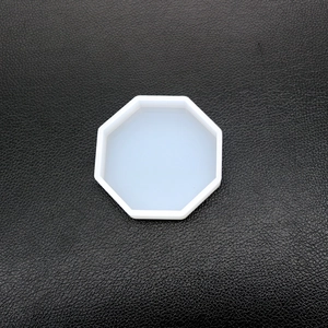 Top-down view of a translucent octagonal silicone mold for DIY resin coasters and crafts