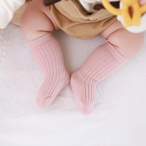 Thick winter warm pink ribbed baby socks made of soft thermal fleece-lined cotton