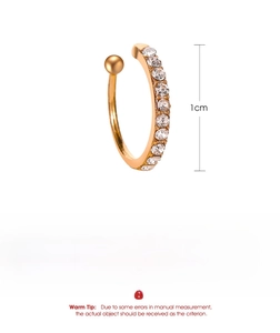 Detailed macro view of 1cm gold ear cuff with white rhinestones and product dimensions