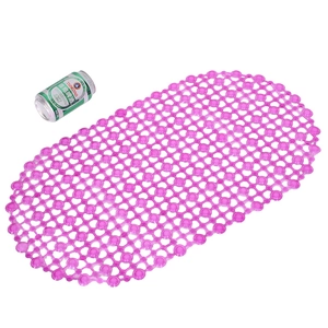 Pink oval non-slip bathroom mat with suction cups and beer can for size reference