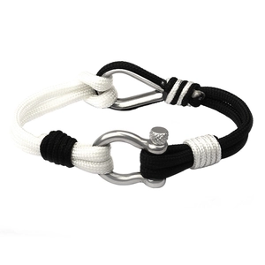 Black and white woven 550 paracord bracelet with a silver stainless steel D-ring buckle