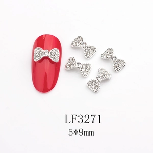 Détail de nœuds décoratifs argentés pour ongles avec strass, 5x9mm, modèle LF3271 pour DIY