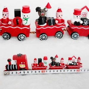 Detailed view of 21cm wooden Christmas train with Santa and snowman figures