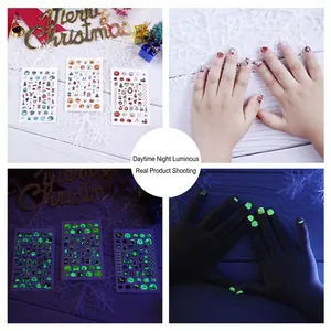 Luminous Christmas nail stickers for kids featuring glowing Santa and reindeer designs