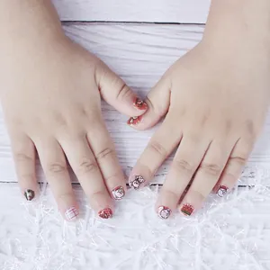 Waterproof luminous Christmas nail stickers for kids featuring Santa and reindeer designs