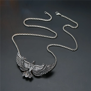 Silver stainless steel punk necklace featuring a detailed flying eagle pendant on chain