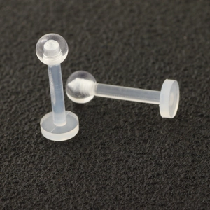 Set of two transparent acrylic labret studs with ball tops and flat back discs