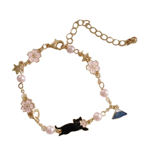 Japanese style cat and cherry blossom gold charm bracelet with Fuji mountain and pearls
