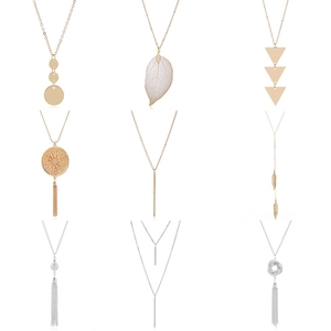Detailed grid of nine minimalist necklaces featuring geometric pendants and pearls