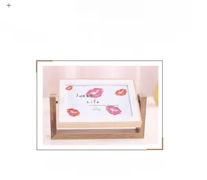 Close-up of a rotating Nordic wooden 4x6 frame with elegant U-shaped bracket and swivel design