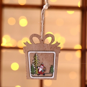Macro detail of laser-cut wooden Christmas gift tag with Santa and tree motifs