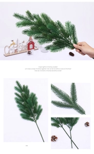 Detail shot of artificial pine branch with pine cones for Christmas DIY decor