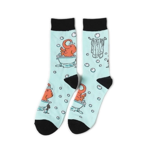 Detail of light blue crew socks with black trim and pixelated elephant bathing pattern