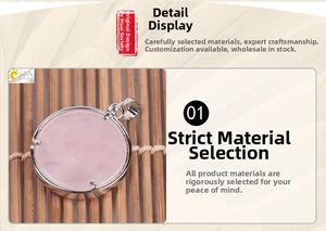 Detailed view of a round pink quartz stone pendant with silver-plated tree of life design