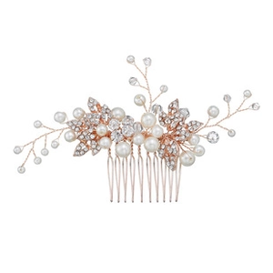 Detail of rose gold flower hair comb with white pearls and sparkling rhinestones