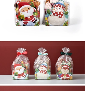 Detail of Christmas gift set showing transparent bags with Santa and reindeer paper bases