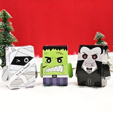 Three Halloween character paper candy boxes featuring Mummy, Frankenstein and Vampire designs