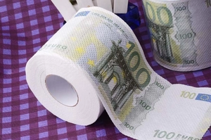 Detail shot of novelty toilet paper printed with a realistic 100 Euro banknote pattern