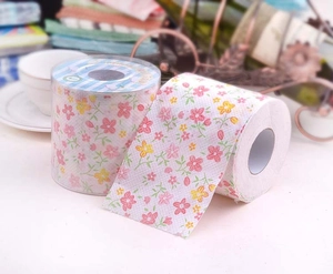 Detail of floral printed toilet paper roll with pink and yellow flower patterns