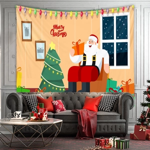 Detail of Christmas wall tapestry featuring Santa Claus and tree over a cozy living room sofa