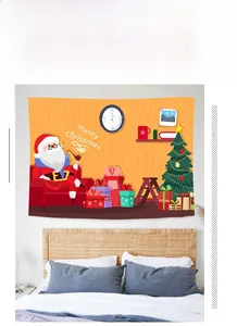 Detail view of Bohemian Christmas tapestry featuring Santa Claus and tree on a bedroom wall