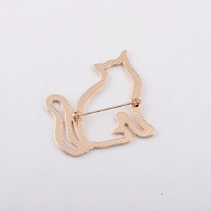 Detailed back view of golden cat brooch showing the pin and secure clasp mechanism