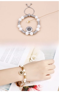 Detail of adjustable pearl and metal bead bracelet with Tree of Life charm on wrist