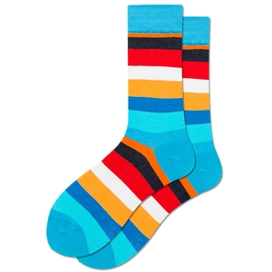Macro detail of colorful striped mid-calf socks with blue ribbed cuffs and vibrant knit texture