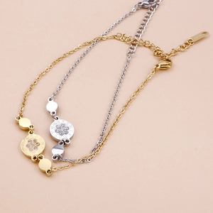 Sparkling round rhinestone bracelet with Roman numeral disc in gold and silver plating