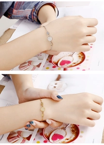 Detail of round rhinestone bracelets in gold and silver finish with adjustable chains
