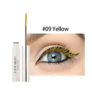 Macro detail of yellow mascara tube and application result on lashes #09 Yellow