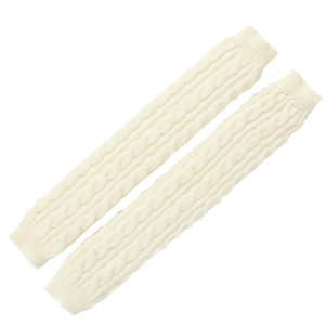 Detailed cable-knit texture of beige knit arm warmers with elastic ribbed cuffs