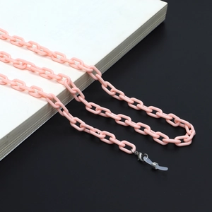 Detail of pink acrylic glasses chain with large links and adjustable silicone loops