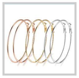 Three-pair set of classic large hoop earrings in rose gold, gold, and silver finishes