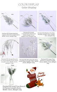 Detailed view of artificial Christmas PE cedar branches with lifelike snow flocking texture