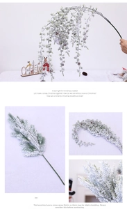 Macro detail of artificial cedar branches with thick white snow texture for Christmas decor