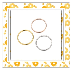 Detailed view of 1mm minimalist stackable rings in rose gold, gold, and silver finishes
