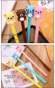 Detail of cute silicone bear pen toppers in yellow, brown, blue, and pink colors