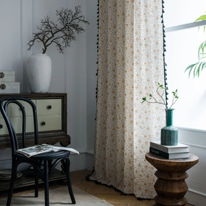 White cotton linen curtain with gold foil bell print and black tassel trim