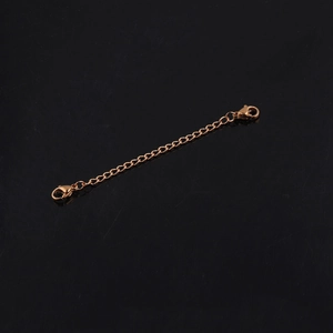 Detail of rose gold stainless steel extender chain with double lobster clasps for jewelry