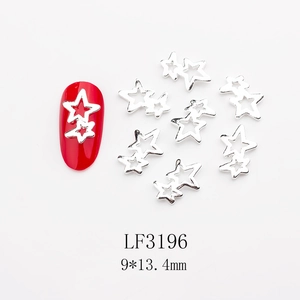 Silver hollow star nail art charms with red manicure display, size 9x13.4mm