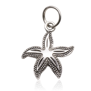 Silver starfish pendant in vintage style made of high-quality metal alloy on white background